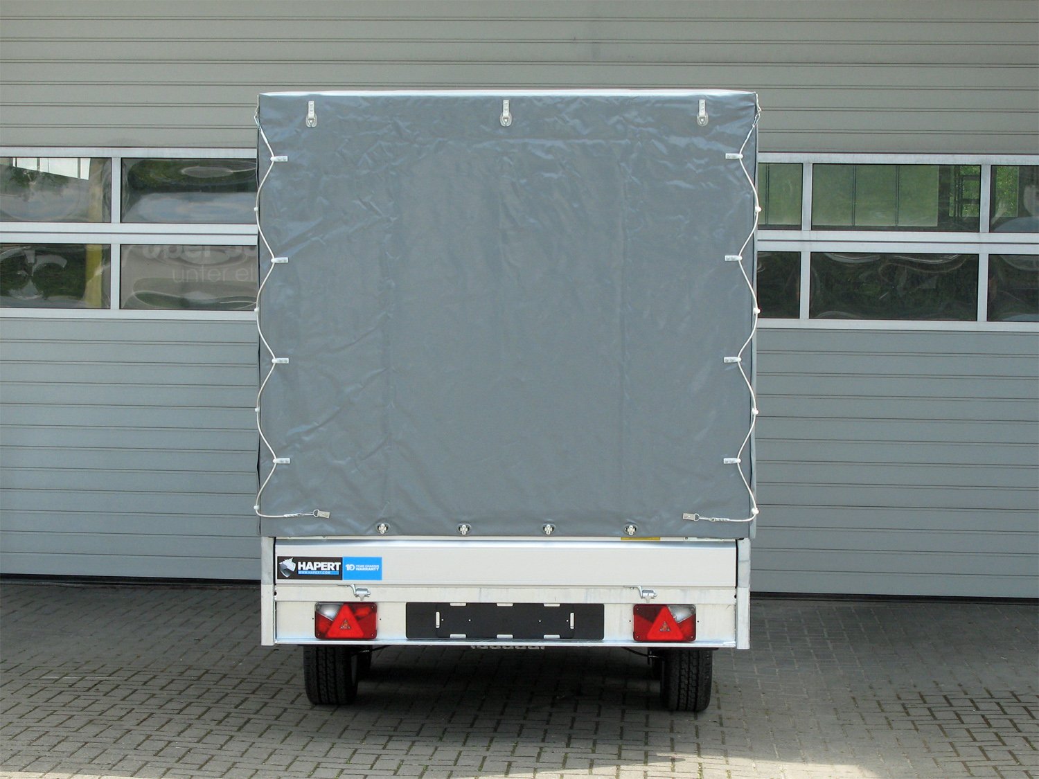 Remorque plateau Hapert Azure H-2 2700 4050 × 2000 mm avec bâche haute 2000 mm